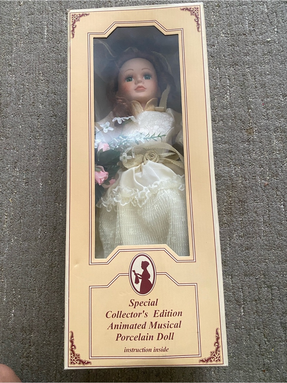 Collector's Edition Porcelain Doll in Cream Dress